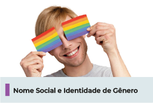 A imagem mostra uma pessoa com cartões nas cores da bandeira LGBTIA+ cobrindo os olhos e sorrindo. Abaixo, uma faixa com o texto 
